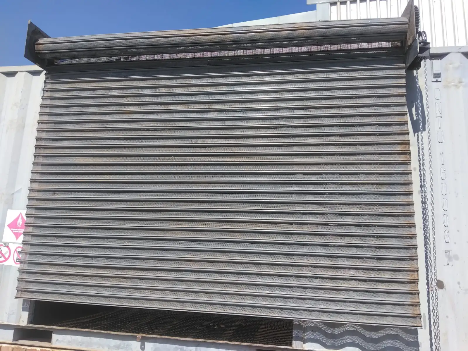 Industrial roller shutter door repair on commercial premises