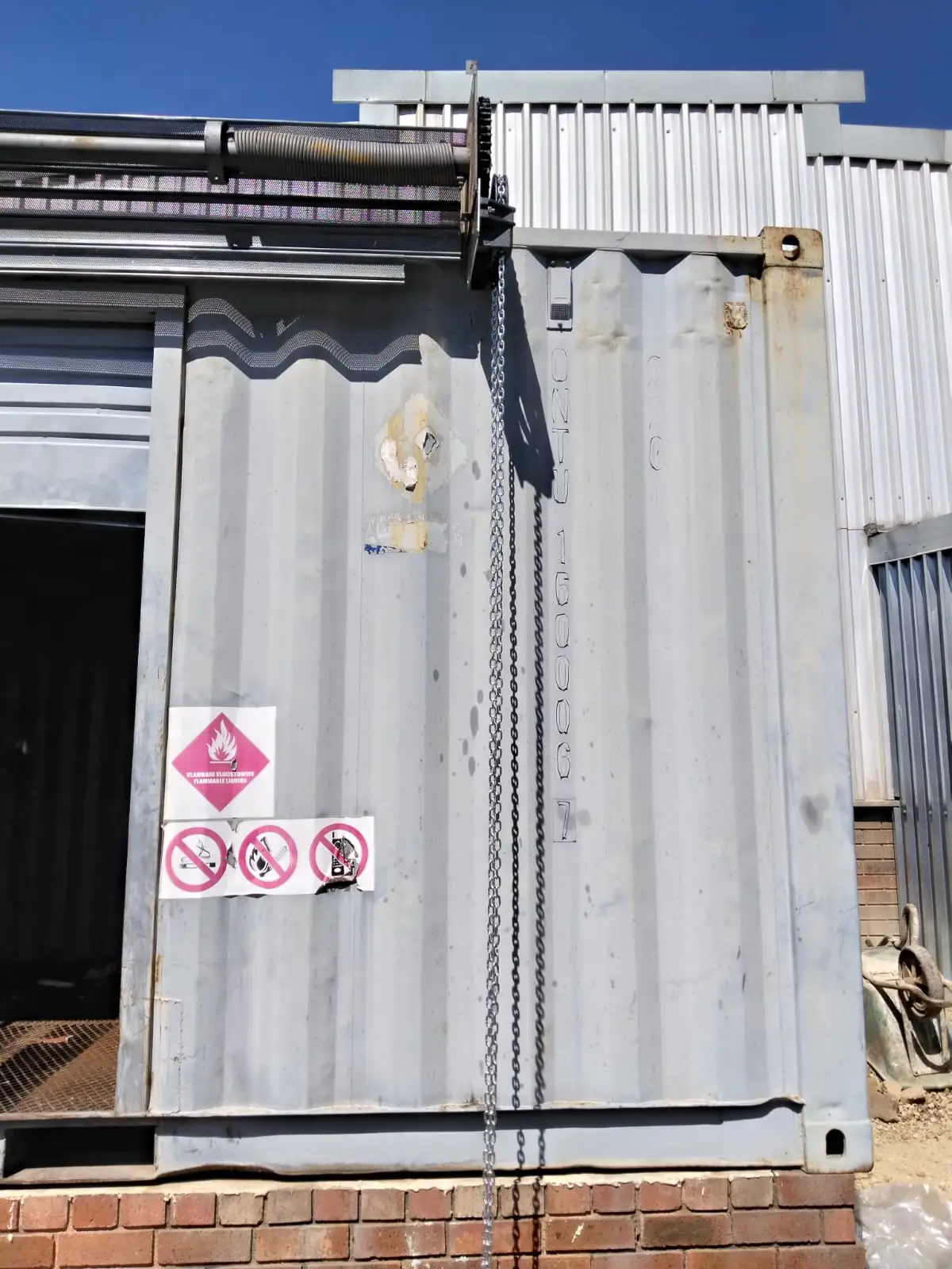 Commercial roller shutter door installation on industrial premises