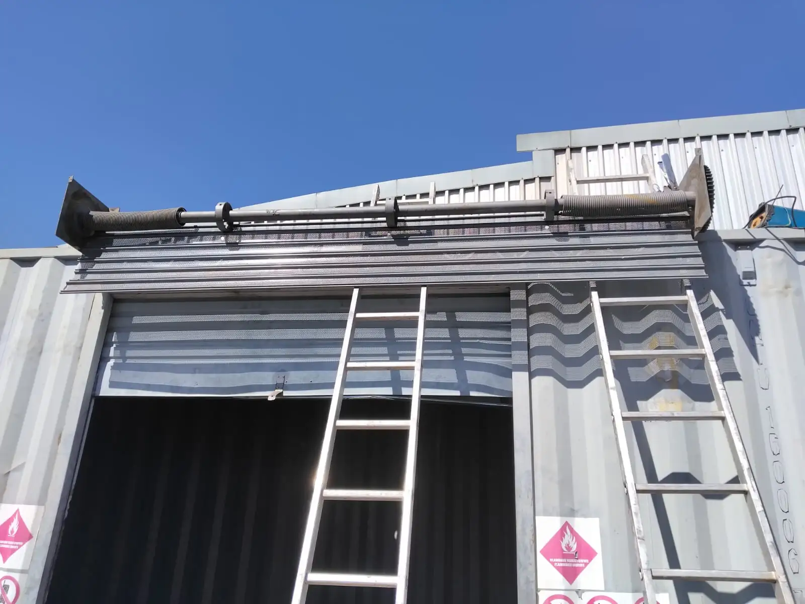 Roller shutter guides and curtain aligned during installation