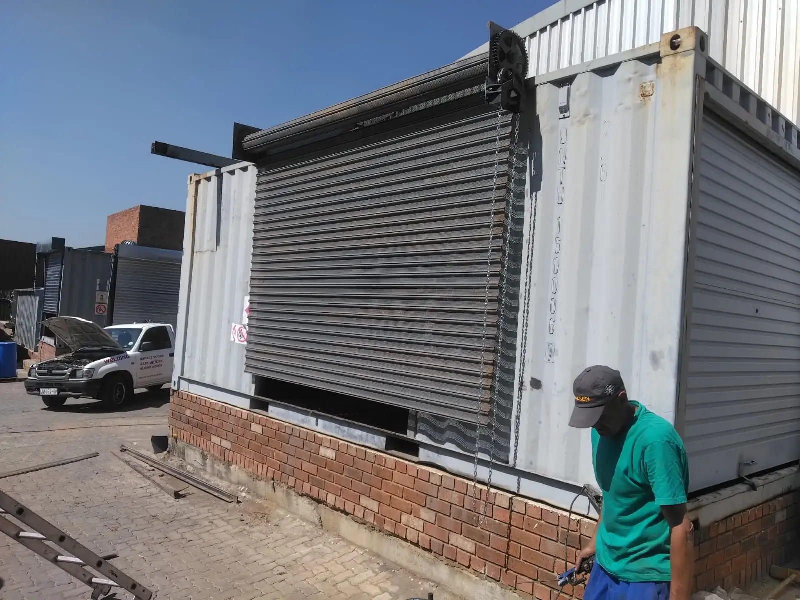 Industrial shutter guide and curtain repair work